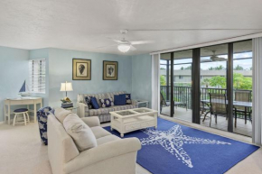 Updated Two Bedroom Beach Residence at Compass Point- Great Amenities with Bikes